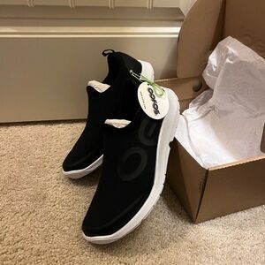 OOFOS Black Slip-On Sneakers